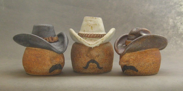 handmade pottery salt shakers cowboy 